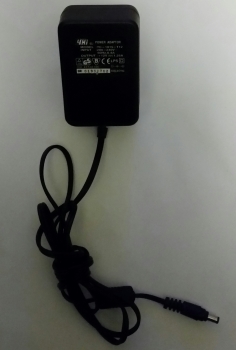 POWER ADAPTOR MODEL:YC-1015-T12 INPUT:200-240V 50Hz, 0.4A OUTPUT:+12V 1.25A