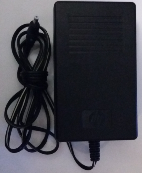 AC/DC Adapter 0957-2142  INPUT: 100-240V 50/60Hz 200mA OUTPUT: 31V- 2420mA MAX