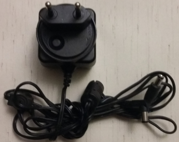 SWITCHING POWER SUPPLY MODEL:ICM06-090 INPUT: 100-240VAC  50/60Hz 0.2A OUTPUT: 9VDC  0.5A 6W MAX