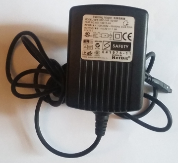 Switching Adapter MODEL:DSC-51F 52100 PART NO: 157-10013-01 INPUT/100-240V 50/60Hz 0.2A 20VA OUTPUT/ +5.2V 1.0A  041976-11