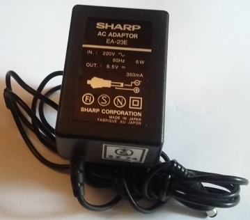 SHARP AC ADAPTOR EA-23E IN.:220V  50Hz 6W OUT.:8.5V 350mA SHARP CORPORATION