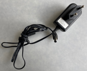 Powertron Electronics Corp.   MODEL:PA1008-2DE INPUT:100-240V 50-60Hz 0.3A OUTPUT: 9.0V 0.5A 4.5W Max  PART NO: PA1008-090DEB