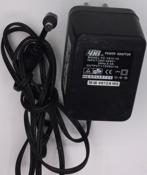 POWER ADAPTOR YC-​1015-T12 OUTPUT:+15VDC 1A