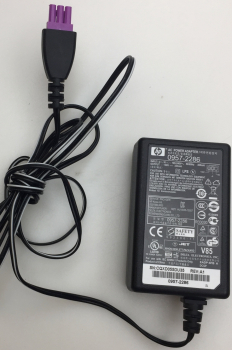 0957-2286 INPUT:100-240V 50/60Hz 300mA OUTPUT: +30V-333mA AC POWER ADAPTER