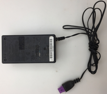 0957-2230 INPUT:100-240V 50/60Hz 1300mA OUTPUT: +32V-560mA AC POWER ADAPTER