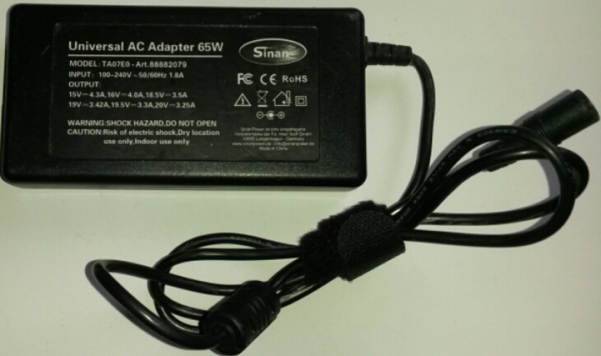 Universal AC Adapter 65W  MODEL:  TA07E0 - Art.88882079  INPUT: 100-240V 50/60Hz 1.8A  OUTPUT: 15V-4.3A, 16V-4.0A, 18.5V-3.5A 19V-3.42A, 19.5V-3.3A,20V-3.25A