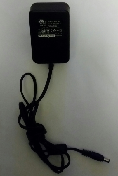 POWER ADAPTOR MODEL:YC-1015-T12 INPUT:200-240V 50Hz, 0.4A OUTPUT:+12V 1.25A