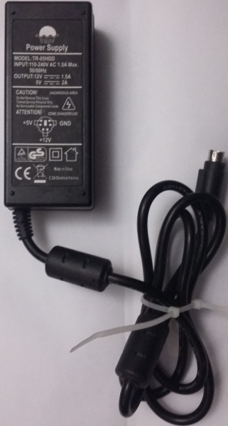 Power Supply MODEL:TR-05HDD INPUT:110-240V AC 1.5A Max. 50/60Hz OUTPUT:12V 1.5A 5V 2A