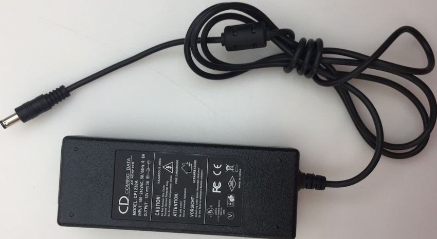 COMING DATA CP1230A INPUT:(100-240V)-0.8A 50/60Hz OUTPUT(12V--3A) AC ADAPTER