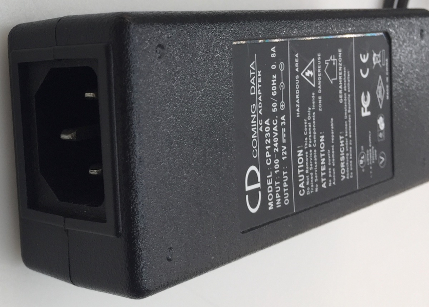 COMING DATA CP1230A INPUT:(100-240V)-0.8A 50/60Hz OUTPUT(12V--3A) AC ADAPTER