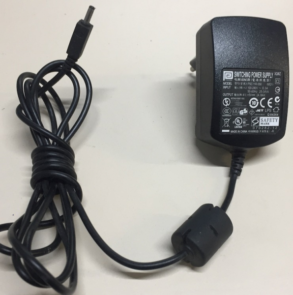 PSC11R-050 IN:100-240V 0.3A 50/60 Hz 25-34VA OUT:5V 2A MAX AC ADAPTER