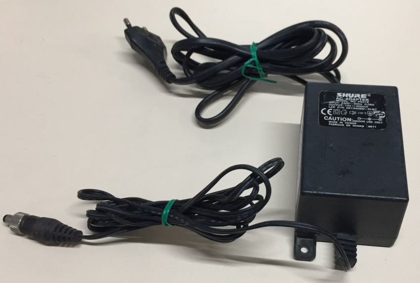PS31E IN:230V 50Hz  0.06A OUT:15V---400mA AC ADAPTER SHURE