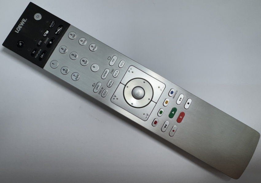 Loewe Assist 1 89900A23-4 Original remote control Universal Alu !!!Battery cover missing!!!